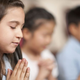 Illustration for article titled The Case For And Against Prayer In Public Schools